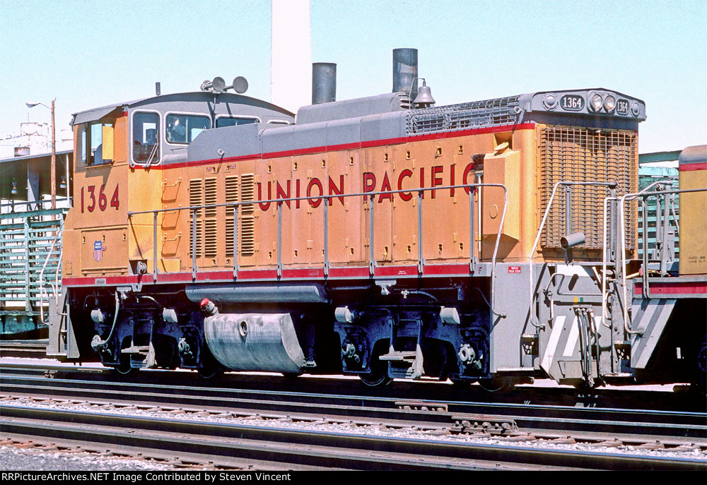 Union Pacific MP15DC UP #1364 with slug S14